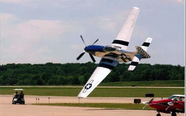 Light aircraft low pass at an Australian airfield